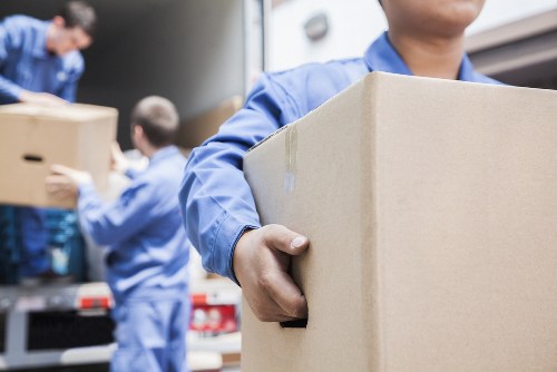 Team applying safe handling procedures during a man with a van Surrey move