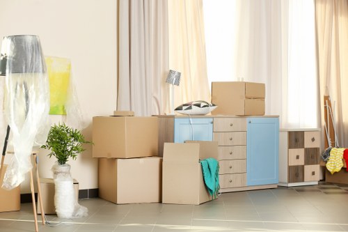 Removal van and boxes ready for a house move in Surrey