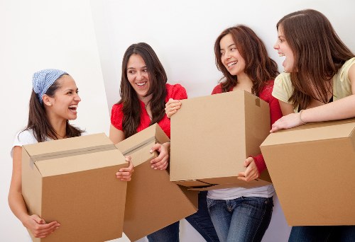 Commercial moving team preparing office equipment for relocation in Surrey