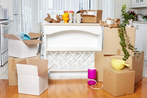 Office removals planning in Surrey with boxes and workstations