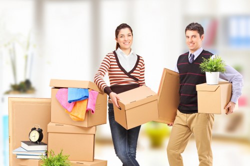 Packed moving boxes and furniture for a Surrey relocation