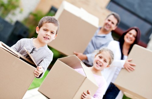 Commercial relocation team moving office equipment in Surrey town centre