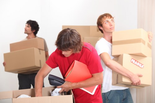 Careful loading of household items for removals in Surrey
