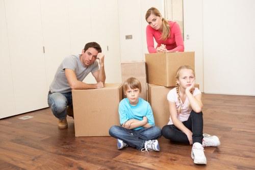 Furniture being carefully moved from a Surrey house