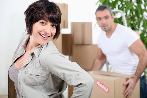 Loading boxes and furniture into a removal truck
