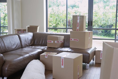 Loading furniture and boxes into a removals van in Surrey