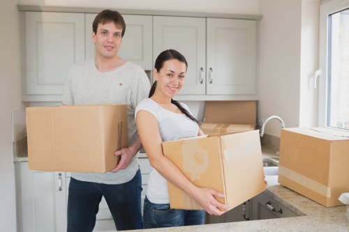 Packed boxes and furniture ready for local removals